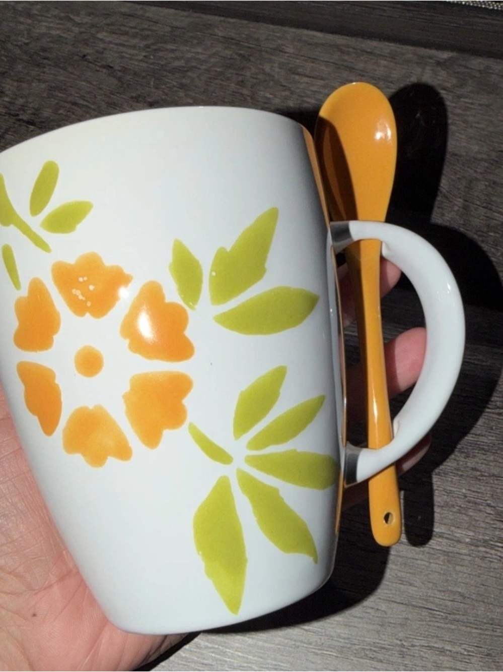 Pier 1 White Mug with Orange Floral Motif and Orange Spoon